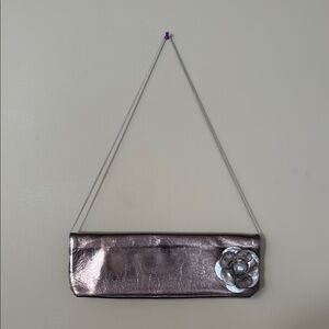 Elegant Silver Clutch with Floral Accent